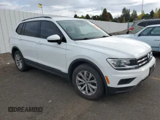 2018 Volkswagen Tiguan S with VIN 3VV0B7AX6JM111232, listed as a Copart auction lot 74944624 with 106,979 mi miles and Salvage Title. Bid and sale history available at DreamBid. Image 4.