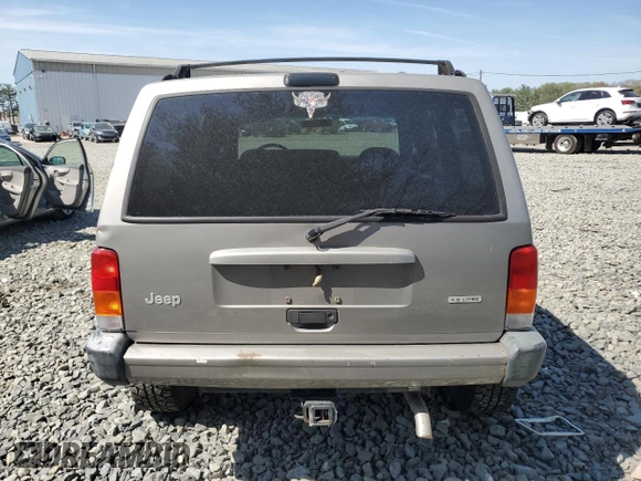 2000 Jeep Cherokee z VIN 1J4FF48S9YL220831, wystawiony jako Copart lot #54304615 z przebiegiem Nie podano mil oraz Szkoda całkowita • Salvage title. Historia ofert i sprzedaży dostępna na DreamBid. Obrazek 6.