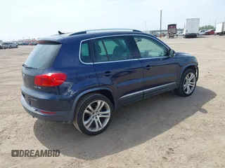 2012 Volkswagen Tiguan SEL with VIN WVGAV7AX8CW536752, listed as a IAAI auction lot 41798619 with 128,223 mi miles and . Bid and sale history available at DreamBid. Image 4.