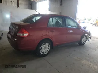 2011 Nissan Versa S with VIN 3N1BC1AP7BL468978, listed as a Copart auction lot 51956355 with 131,307 mi miles and Salvage title. Bid and sale history available at DreamBid. Image 3.