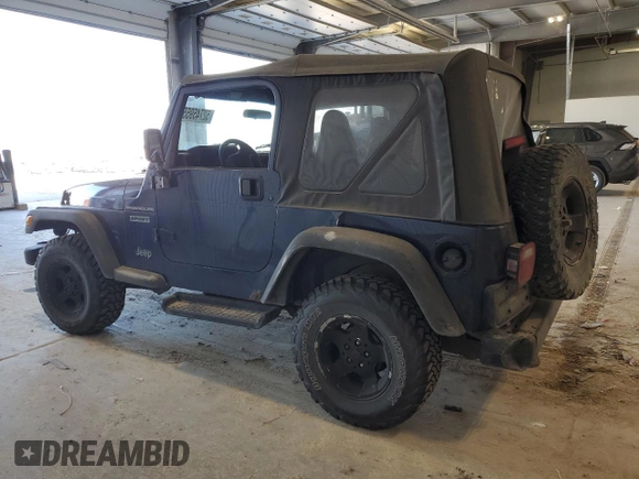 2002 Jeep Wrangler Sport with VIN 1J4FA49S82P713459, listed as a Copart auction lot 52745955 with 173,297 mi miles and Salvage Title. Bid and sale history available at carsss.com. Image 2.