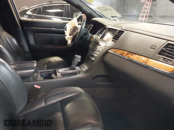 2013 Lincoln MKS с VIN 1LNHL9EK3DG615529, выставлен на аукционе IAAI как лот 42288732 с пробегом 135 876 миль миль и . История ставок и продаж доступна на DreamBid. Изображение 5.