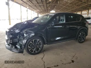 2023 Mazda CX-5 2.5 S Premium Plus Package with VIN JM3KFBEM2P0217307, listed as a Copart auction lot 44818595 with 64,219 mi miles and Salvage Title. Bid and sale history available at carsss.com. Image 1.