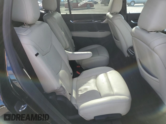 2021 Cadillac XT6 Sport z VIN 1GYKPGRS0MZ215942, wystawiony jako Copart lot #84830084 z przebiegiem 29 930 mil mil oraz Szkoda całkowita • Salvage title. Historia ofert i sprzedaży dostępna na DreamBid. Obrazek 12.