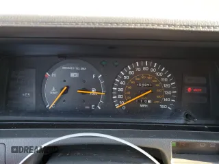 1990 Toyota Camry z VIN 4T1VV21EXLU008760, wystawiony jako Copart lot #88344665 z przebiegiem 154 971 mil mil oraz Nie do naprawy • Non repairable. Historia ofert i sprzedaży dostępna na DreamBid. Obrazek 9.