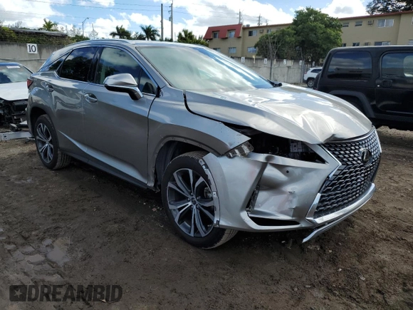 2021 Lexus RX with VIN 2T2HZMAAXMC218526, listed as a Copart auction lot 71356932 with 10,616 mi miles. Bid and sale history available at carsss.com. Image 4.