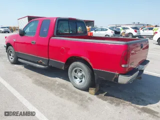 1998 Ford F-150 Standard with VIN 1FTZX1729WKB42151, listed as a IAAI auction lot 42074530 with 174,690 mi miles. Bid and sale history available at carsss.com. Image 3.