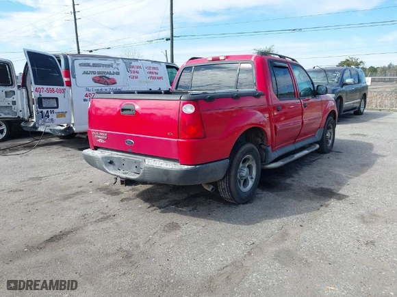 2005 Ford Explorer Sport Trac XLS with VIN 1FMZU67K65UA71317, listed as a IAAI auction lot 41523150 with 207,896 mi miles. Bid and sale history available at carsss.com. Image 4.