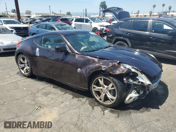 2010 Nissan 370Z Touring с VIN JN1AZ4EH6AM500824, выставлен на аукционе Copart как лот 53403185 с пробегом 115 892 миль миль и Чистый • Clean title. История ставок и продаж доступна на DreamBid. Изображение 4.