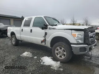 2015 Ford Super Duty F-250 SRW Lariat with VIN 1FT7W2BT5FEC36574, listed as a Copart auction lot 43209995 with 194,884 mi miles and Salvage Title. Bid and sale history available at carsss.com. Image 4.