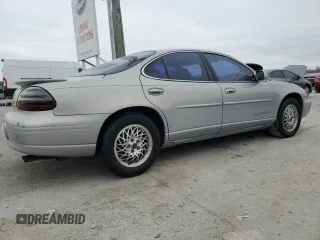 2000 Pontiac Grand Prix SE with VIN 1G2WJ52K5YF285584, listed as a Copart auction lot 84926094 with 123,146 mi miles and Salvage Title. Bid and sale history available at carsss.com. Image 3.