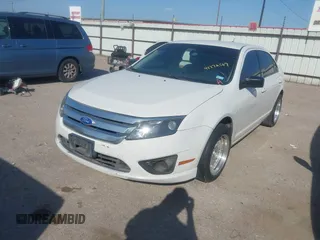 2011 Ford Fusion S with VIN 3FAHP0GA4BR268927, listed as a IAAI auction lot 41772569 with 305,339 mi miles. Bid and sale history available at carsss.com. Image 2.
