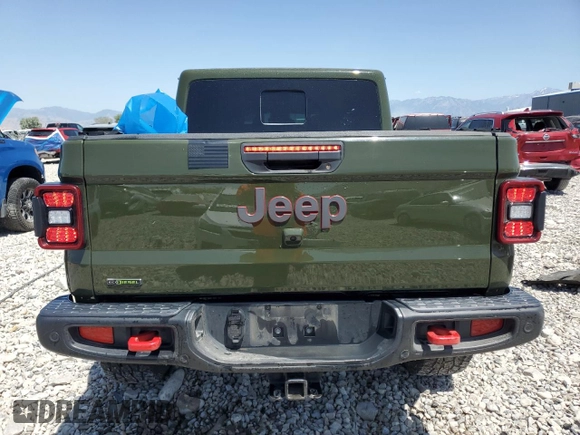 2023 Jeep Gladiator Rubicon с VIN 1C6JJTBM8PL515539, выставлен на аукционе Copart как лот 61076725 с пробегом 21 434 миль миль и Списание • Salvage title. История ставок и продаж доступна на DreamBid. Изображение 6.