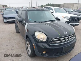 2015 MINI Countryman with VIN WMWZB3C53FWR43819, listed as a IAAI auction lot 41610007 with 134,185 mi miles and . Bid and sale history available at DreamBid. Image 1.