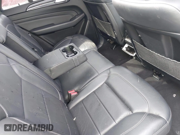 2015 Mercedes-Benz M 400 with VIN 4JGDA5GB9FA594766, listed as a IAAI auction lot 41835853 with 106,873 mi miles and . Bid and sale history available at DreamBid. Image 8.