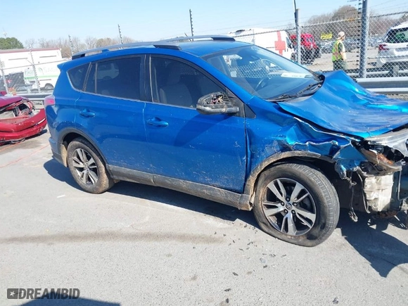 2018 Toyota RAV4 XLE with VIN JTMWFREV7JJ730968, listed as a IAAI auction lot 41778761 with 122,102 mi miles. Bid and sale history available at carsss.com. Image 13.