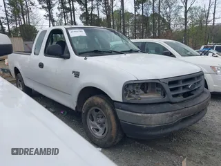 2001 Ford F-150 XL z VIN 1FTRX17W81NB41082, wystawiony jako IAAI lot #41943194 z przebiegiem 207 544 mil mil oraz . Historia ofert i sprzedaży dostępna na DreamBid. Obrazek 1.