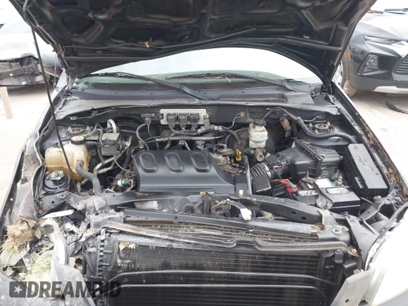 2005 Mazda Tribute S with VIN 4F2YZ96145KM32776, listed as a IAAI auction lot 42159162 with 200,416 mi miles and . Bid and sale history available at DreamBid. Image 10.