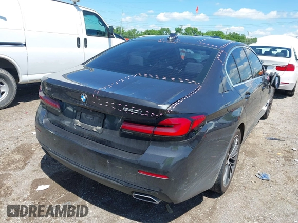 2021 BMW 5 Series 540i xDrive with VIN WBA73BJ02MWW93833, listed as a IAAI auction lot 42160043 with 59,779 mi miles and . Bid and sale history available at DreamBid. Image 4.