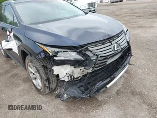 2016 Lexus RX 350 with VIN 2T2BZMCA1GC012079, listed as a IAAI auction lot 42265304 with 124,861 mi miles and . Bid and sale history available at DreamBid. Image 6.