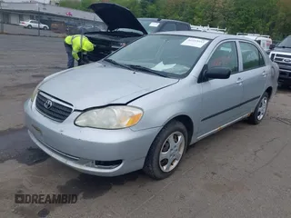 2005 Toyota Corolla CE with VIN 2T1BR32E95C486720, listed as a IAAI auction lot 42233051 with 151,842 mi miles and . Bid and sale history available at DreamBid. Image 2.