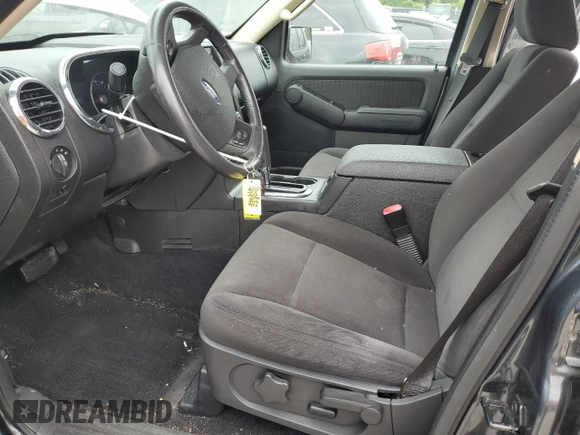 2010 Ford Explorer XLT with VIN 1FMEU6DE4AUA64406, listed as a Copart auction lot 57461695 with 143,733 mi miles and Salvage title. Bid and sale history available at DreamBid. Image 7.