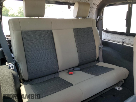 2010 Jeep Wrangler Sahara with VIN 1J4AA5D15AL167384, listed as a Copart auction lot 64210485 with 138,320 mi miles and Clean title. Bid and sale history available at DreamBid. Image 11.