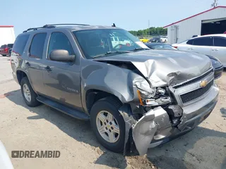 2007 Chevrolet Tahoe LS with VIN 1GNFC13C17J346292, listed as a IAAI auction lot 42392616 with 171,146 mi miles and . Bid and sale history available at DreamBid. Image 1.