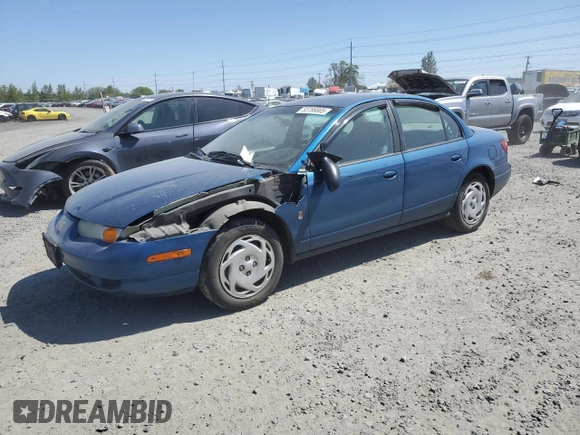 2001 Saturn SL z VIN 1G8ZK547X1Z294553, wystawiony jako Copart lot #53786805 z przebiegiem 288 011 mil mil oraz Szkody całkowita. Historia ofert i sprzedaży dostępna na DreamBid. Obrazek 1.