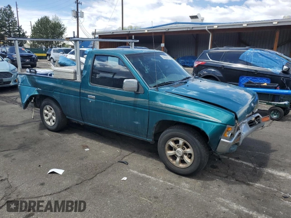 1997 Nissan Frontier XE with VIN 1N6SD11SXVC332100, listed as a Copart auction lot 54330245 with 203,959 mi miles and Salvage title. Bid and sale history available at DreamBid. Image 4.