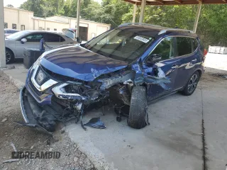 2017 Nissan Rogue SV with VIN JN8AT2MT0HW154202, listed as a Copart auction lot 65833855 with 144,125 mi miles and Salvage title. Bid and sale history available at DreamBid. Image 1.