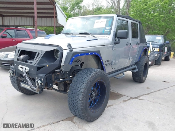 2015 Jeep Wrangler Unlimited Sport with VIN 1C4HJWDG6FL759236, listed as a IAAI auction lot 41932967 with 105,297 mi miles. Bid and sale history available at carsss.com. Image 17.