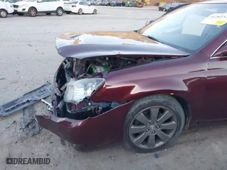 2007 Toyota Avalon XL with VIN 4T1BK36B27U220574, listed as a IAAI auction lot 41283334 with 125,336 mi miles. Bid and sale history available at carsss.com. Image 6.