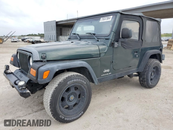 2003 Jeep Wrangler SE with VIN 1J4FA29103P313229, listed as a Copart auction lot 79337984 with 135,668 mi miles and Salvage title. Bid and sale history available at DreamBid. Image 1.