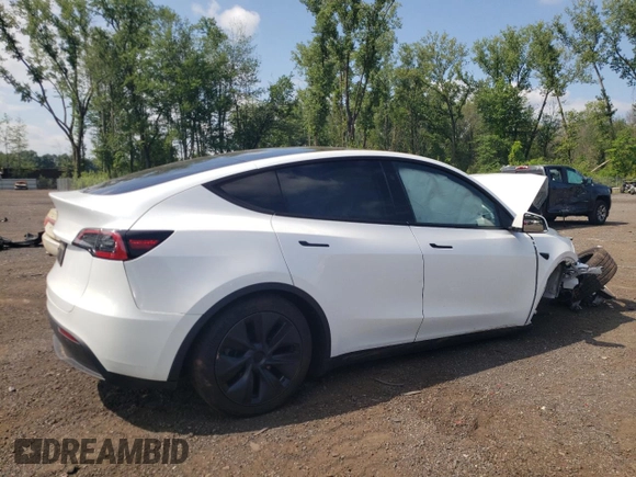 2024 Tesla Model Y with VIN 7SAYGDED9RF133701, listed as a Copart auction lot 64060785 with Not provided miles and Salvage title. Bid and sale history available at DreamBid. Image 3.