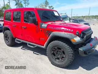 2020 Jeep Wrangler Unlimited Rubicon with VIN 1C4HJXFG9LW106607, listed as a IAAI auction lot 41908295 with 71,083 mi miles and . Bid and sale history available at DreamBid. Image 6.
