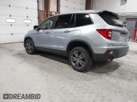 2021 Honda Passport EX-L with VIN 5FNYF8H56MB000107, listed as a IAAI auction lot 41868429 with 66,572 mi miles and . Bid and sale history available at DreamBid. Image 3.