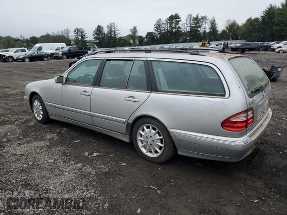 2000 Mercedes-Benz E-Class AWD with VIN WDBJH82J6YX039226, listed as a Copart auction lot 72559034 with 213,680 mi miles and Clean Title. Bid and sale history available at carsss.com. Image 2.