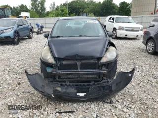 2008 Honda Fit with VIN JHMGD384X8S068090, listed as a Copart auction lot 61133985 with 177,729 mi miles and Clean title. Bid and sale history available at DreamBid. Image 5.
