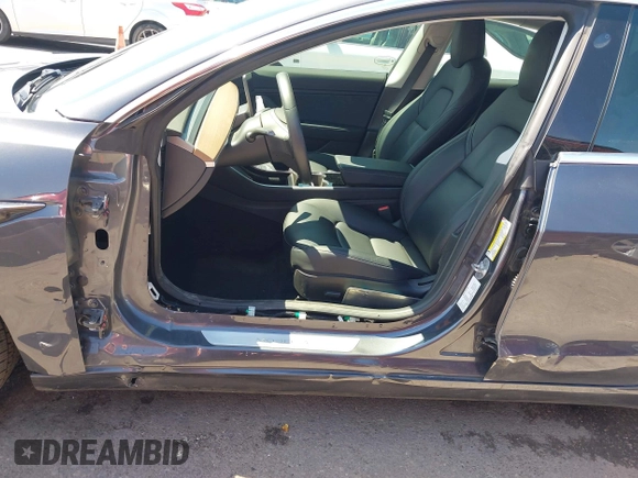 2019 Tesla Model 3 Long Range with VIN 5YJ3E1EB9KF386047, listed as a IAAI auction lot 42215362 with 41,246 mi miles and . Bid and sale history available at DreamBid. Image 6.
