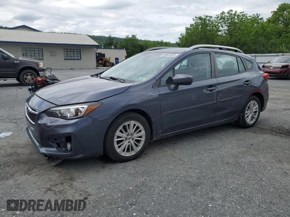 2017 Subaru Impreza Premium with VIN 4S3GTAD61H3711128, listed as a Copart auction lot 58942425 with 127,890 mi miles and Salvage title. Bid and sale history available at DreamBid. Image 1.