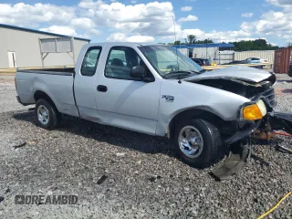2004 Ford F-150 XL with VIN 2FTRX17W24CA52991, listed as a Copart auction lot 55853095 with 221,452 mi miles and Salvage title. Bid and sale history available at DreamBid. Image 4.