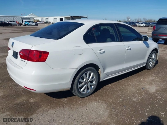 2011 Volkswagen Jetta Sedan SE w/Convenience & Sunroof with VIN 3VWDX7AJ9BM321156, listed as a IAAI auction lot 41654120 with NaN miles. Bid and sale history available at carsss.com. Image 4.