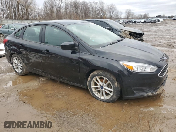 2018 Ford Focus SE z VIN 1FADP3F2XJL249158, wystawiony jako Copart lot #47930695 z przebiegiem 160 765 mil mil oraz Czysty tytuł • Clean title. Historia ofert i sprzedaży dostępna na DreamBid. Obrazek 4.