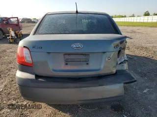 2007 Kia Rio LX with VIN KNADE123X76253489, listed as a Copart auction lot 52176475 with 148,154 mi miles and Salvage Title. Bid and sale history available at carsss.com. Image 6.
