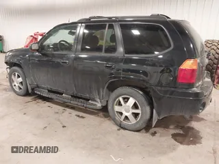 2005 GMC Envoy SLT with VIN 1GKDT13S452349125, listed as a IAAI auction lot 41148381 with 224,049 mi miles. Bid and sale history available at carsss.com. Image 3.