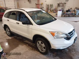 2010 Honda CR-V LX with VIN JHLRE4H39AC003223, listed as a IAAI auction lot 42412110 with 154,434 mi miles and . Bid and sale history available at DreamBid. Image 1.