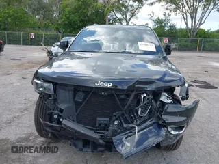 2018 Jeep Grand Cherokee Altitude with VIN 1C4RJFAG6JC504653, listed as a IAAI auction lot 42706233 with 62,059 mi miles and . Bid and sale history available at DreamBid. Image 12.