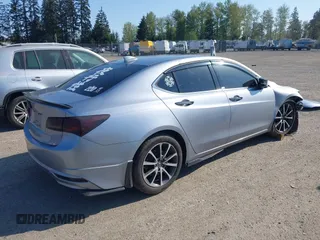 2015 Acura TLX V6 with VIN 19UUB2F32FA025334, listed as a IAAI auction lot 42099075 with 107,409 mi miles. Bid and sale history available at carsss.com. Image 4.