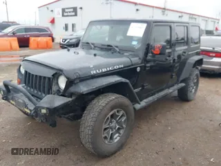 2012 Jeep Wrangler Unlimited Rubicon with VIN 1C4HJWFGXCL142804, listed as a IAAI auction lot 42183960 with 124,392 mi miles and . Bid and sale history available at DreamBid. Image 17.